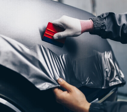 Applying Materials On Car | Commercial Vehicle Wrap in Bowling Green KY